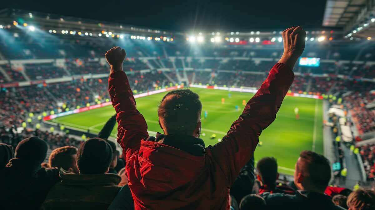 Supporter de football encourageant son équipe